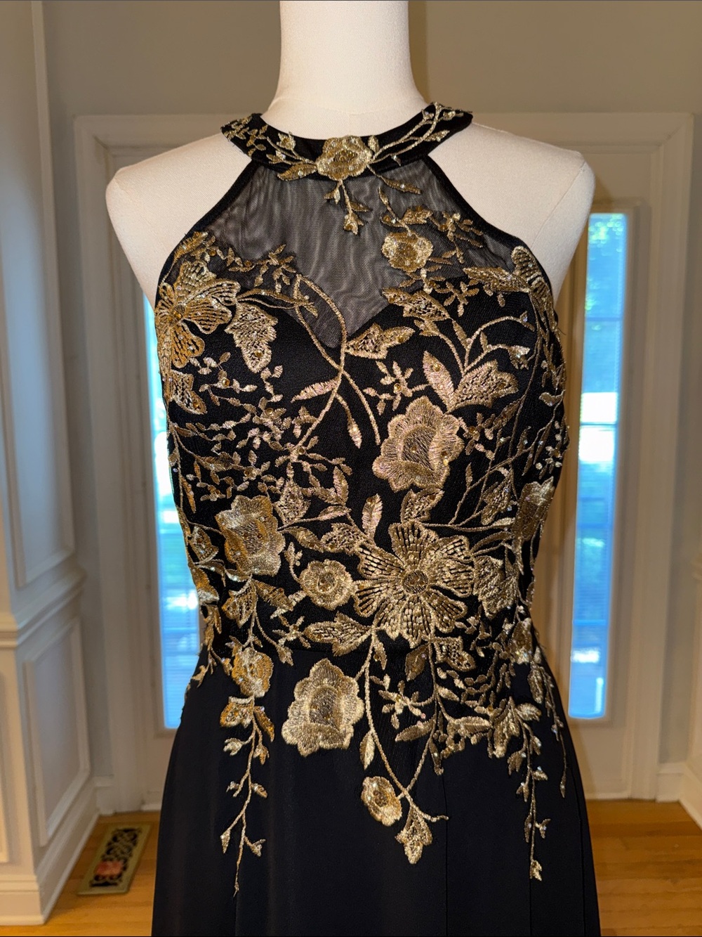 Betsy & AdamElegant Black Halter Evening Gown with Gold Floral Embroidery - Picture 4 of 5